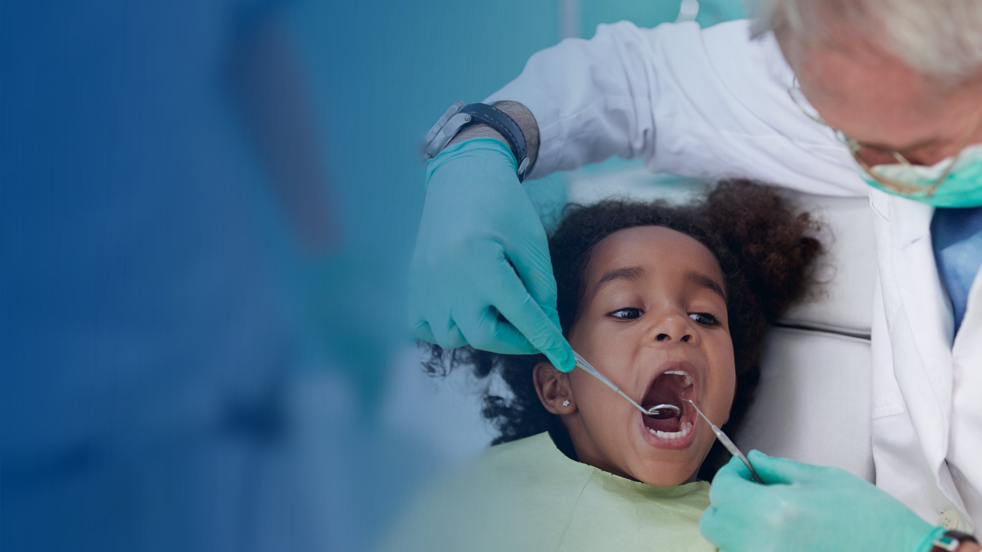 A child receiving dental care at a Music for a Brighter Tomorrow event